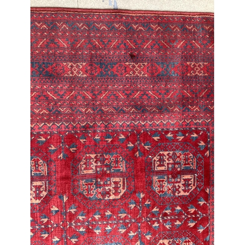 509 - Large red and yellow rug with 18 centred medallion 209 cm x 300 cm