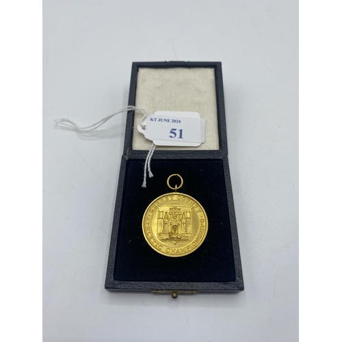 51 - A 9ct gold athletics medal. Surrey County Athletics Championship. 1934. 22 yards. In fitted case. 12... 