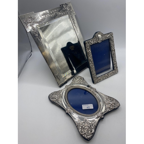 62 - A sterling silver mahogany backed easel dressing table mirror. Bevelled plate with swag and garland ... 