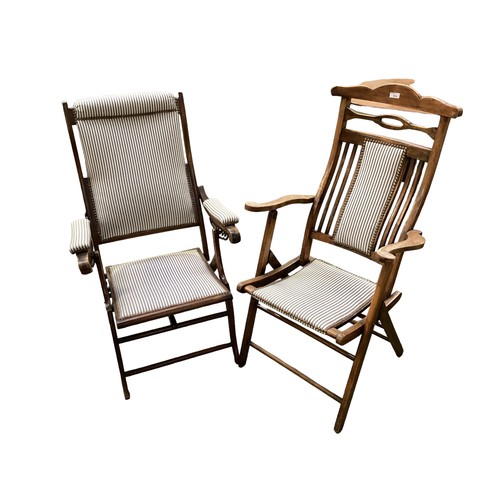 594 - Two Edwardian folding adjustable deck chairs, with studded striped black and white matching fabric