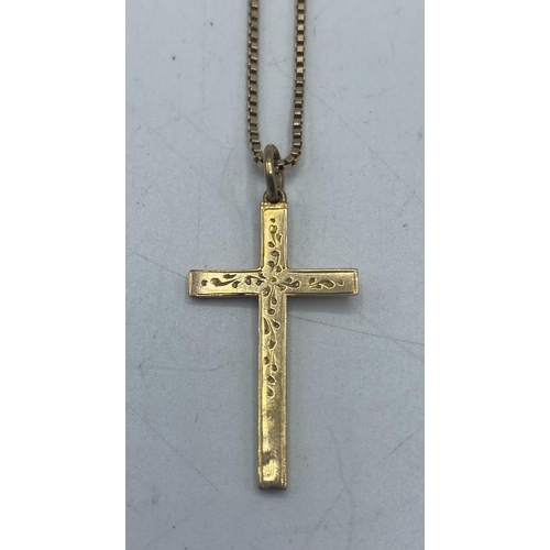 106 - A 9ct gold  box link chain together with a 9ct crucifix pendant. 38cm. 2.5g.