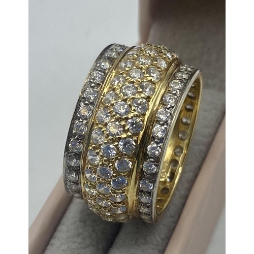 92 - An 18ct gold and diamond full eternity band. Five lines of single cut diamonds. 8.1g. Size N.