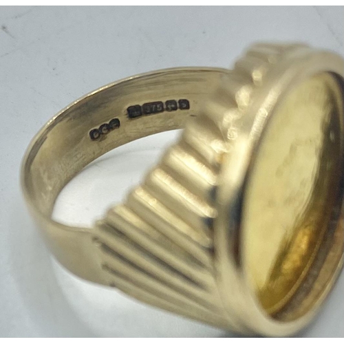 96 - A 9ct gentleman's gold signet ring set with 1/10th Krugerrand. 8.1g. Size L.