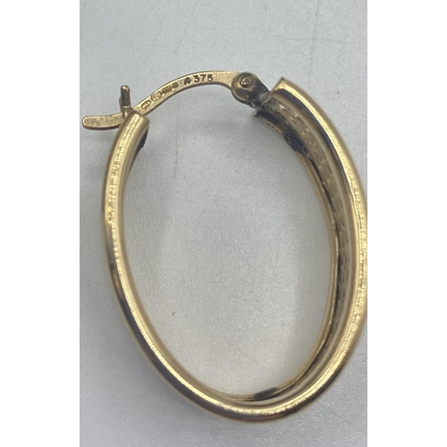 97 - A pair of 9ct gold hoop earrings together with a pair of 9ct gold diamond set earrings. 5.40g