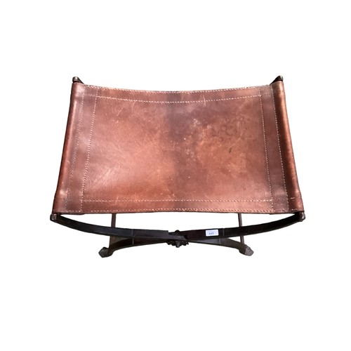 645 - Tan leather seat stool on folding heavy iron X base