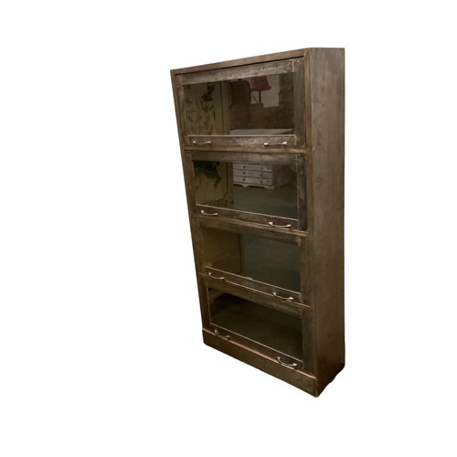 518 - Globe Wernicke style one piece metal cabinet with four sections.