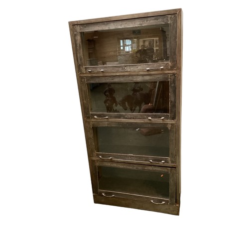 518 - Globe Wernicke style one piece metal cabinet with four sections.