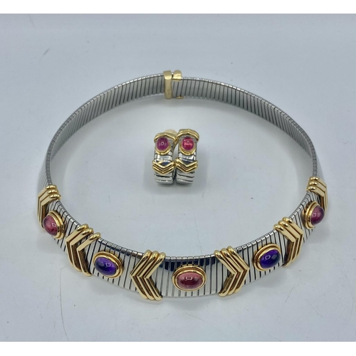 10 - BULGARI. An 18ct gold and stainless steel gem set Tubogas collar necklace with matching ear clips. G... 
