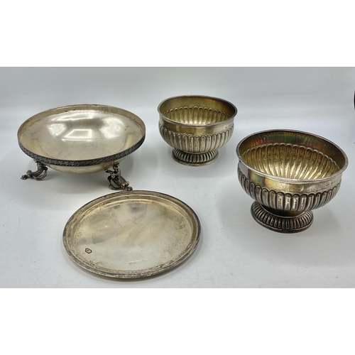 144 - A pair of sterling silver circular fluted bowls together with a Mappin and Webb bowl with cast feet ... 