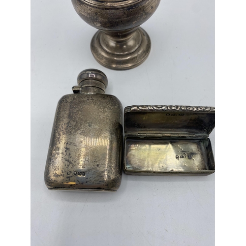 146 - A collection of sterling silver items, sugar castor, small hip flask and an etched snuff by William ... 