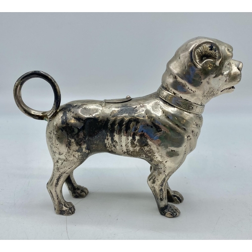 148 - A 930 marked silver creamer modelled as a pug dog. 12cm x 15cm. Continental marks to foot, 172g; Pur... 