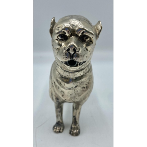 148 - A 930 marked silver creamer modelled as a pug dog. 12cm x 15cm. Continental marks to foot, 172g; Pur... 