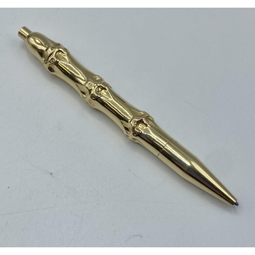 165 - Cartier. A rare vintage 14ct gold bamboo design ball point pen.  Hallmarked 14k with etched Cartier ... 