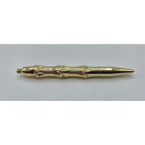 165 - Cartier. A rare vintage 14ct gold bamboo design ball point pen.  Hallmarked 14k with etched Cartier ... 