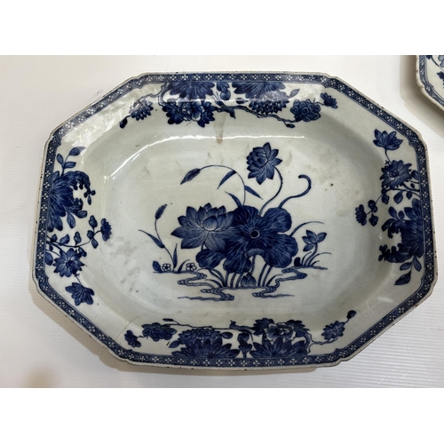 205 - Two blue and white meat platters together with four famille rose hexagonal plates (staple repairs)