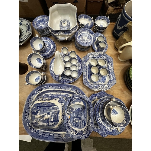 213 - A Spode dining service.  Blue and white Italian pattern. With lidded tureens , serving platters etc,