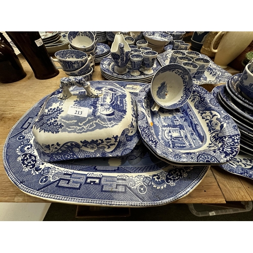 213 - A Spode dining service.  Blue and white Italian pattern. With lidded tureens , serving platters etc,