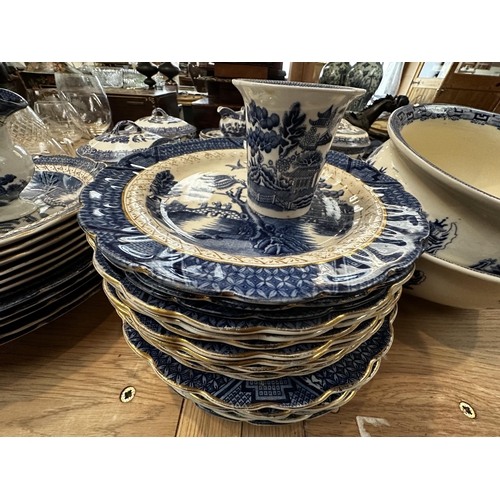 243 - A quantity of china and glass, to include Booths blue and white Old Willow pattern china, etc