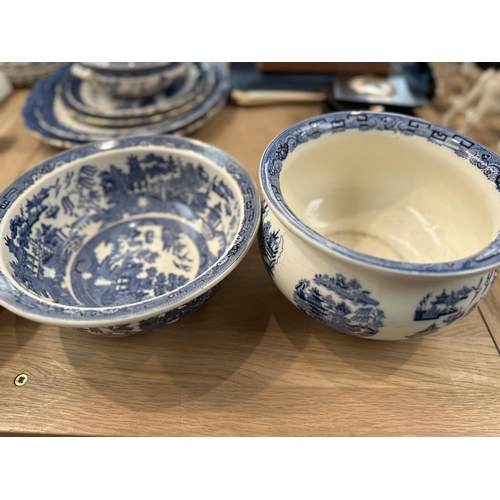 243 - A quantity of china and glass, to include Booths blue and white Old Willow pattern china, etc