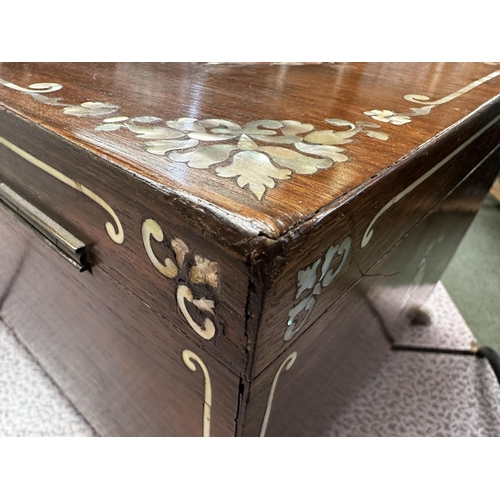 253 - Two boxes: A black lacquer wooden sewing box, with contents, mother of pearl spindles etc, the lid d... 