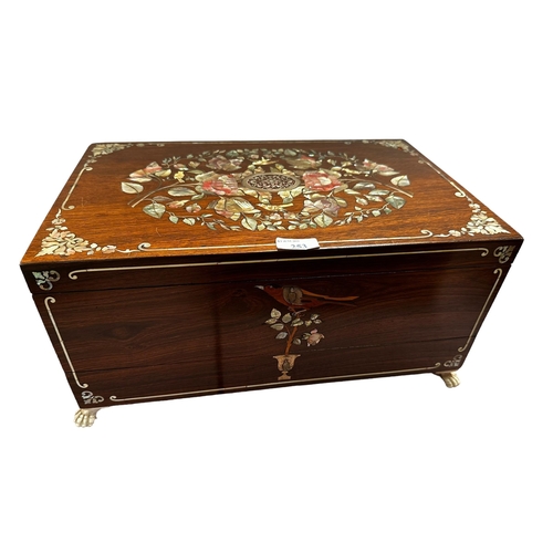253 - Two boxes: A black lacquer wooden sewing box, with contents, mother of pearl spindles etc, the lid d... 