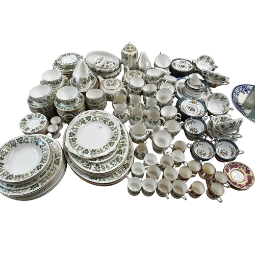 258 - A Wedgwood part dinner service, and An Aynsley tea set and a Thomas Goode & Co gilt set of six coffe... 