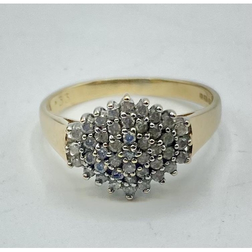 78 - A 9ct gold and white metal diamond cluster ring , numerously set with single brilliant cut diamonds,... 