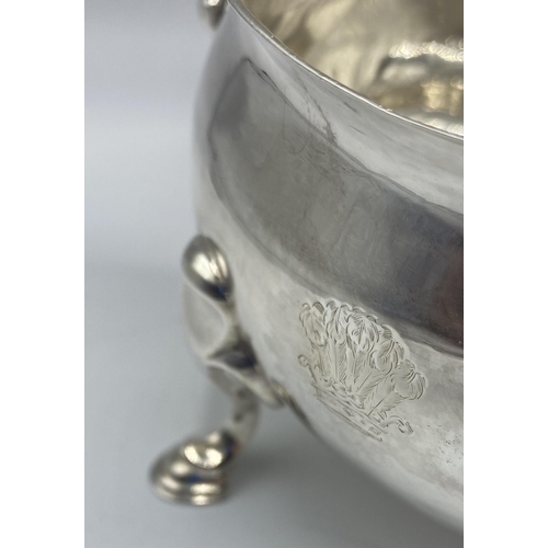 33 - A pair of large sterling silver sauce boats with scroll handles by Francis Crump London 1757. 640g.