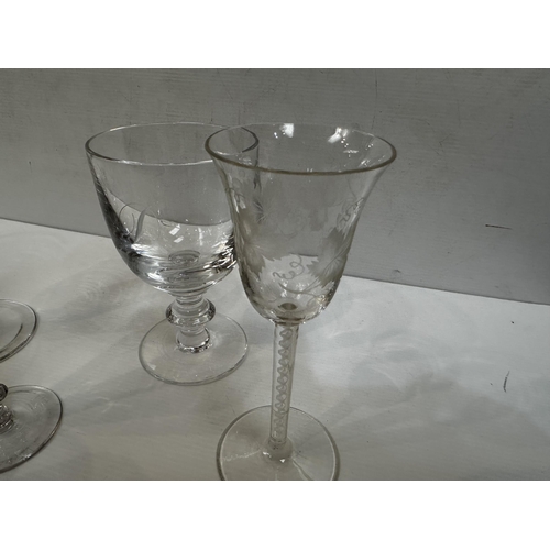 342 - A collection of 18th/19th century style stemmed drinking glasses.