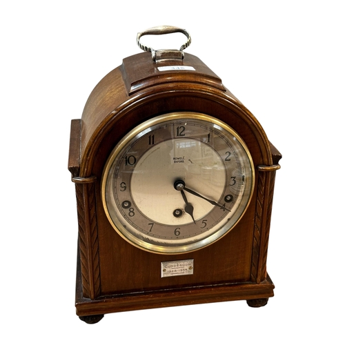 345 - An mahogany and brass mantle clock, the circular brass dial  stamped Rowell Oxford 28cm(h)