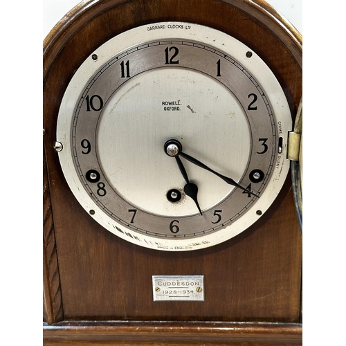 345 - An mahogany and brass mantle clock, the circular brass dial  stamped Rowell Oxford 28cm(h)