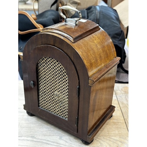 345 - An mahogany and brass mantle clock, the circular brass dial  stamped Rowell Oxford 28cm(h)