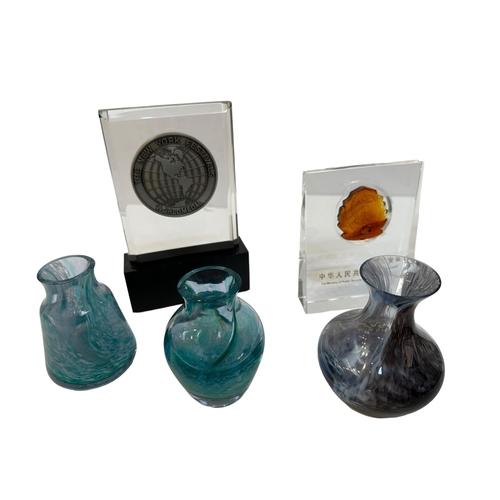 351 - Three Caithness style vases together with a Chinese presentation glass paperweights.