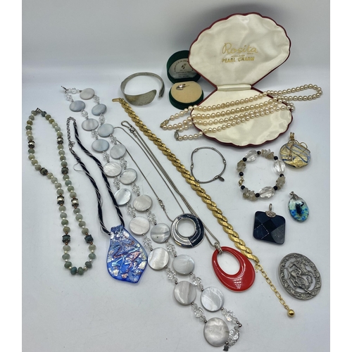 47 - A collection of costume jewellery to include a Trifari gilt yellow metal necklace sterling silver an... 