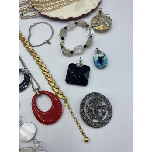 47 - A collection of costume jewellery to include a Trifari gilt yellow metal necklace sterling silver an... 