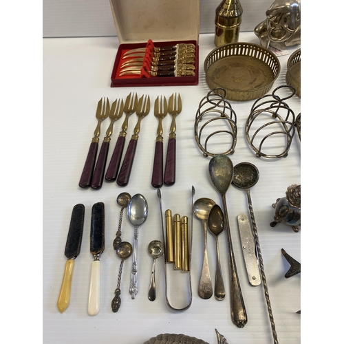 150 - A collection of silver plated and white metal items, the fishes were purchased from Hymie Danker in ... 