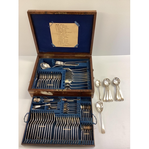 151 - A 12 person canteen of silver plated cutlery in brass bound oak case.