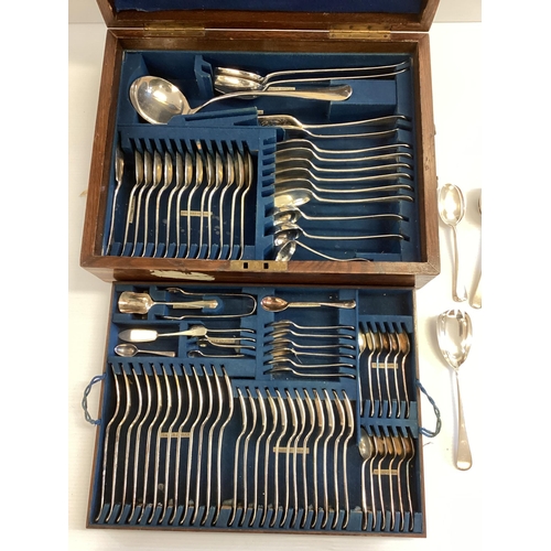 151 - A 12 person canteen of silver plated cutlery in brass bound oak case.