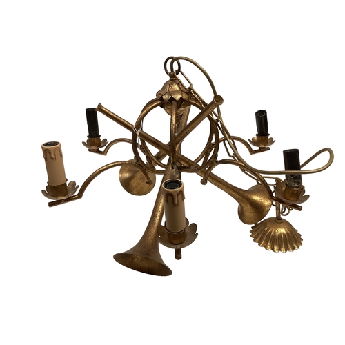 231 - A gilt coloured modern 6 branch chandelier, modelled with two crossed hunting horns, 37cm High