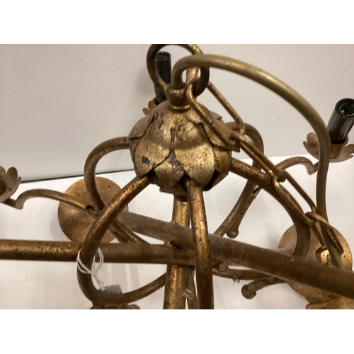 231 - A gilt coloured modern 6 branch chandelier, modelled with two crossed hunting horns, 37cm High