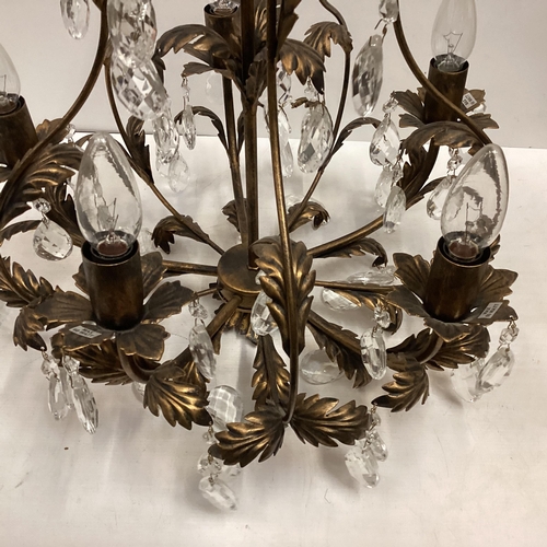 235 - A modern decorative brass style chandelier, with five light branches, and glass lustre drops, 54cm H