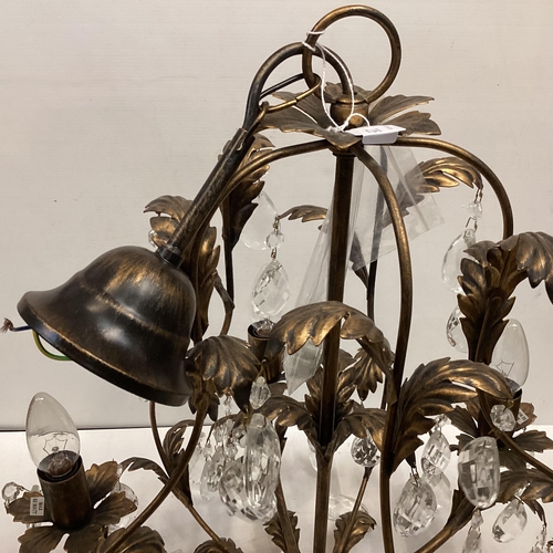 235 - A modern decorative brass style chandelier, with five light branches, and glass lustre drops, 54cm H