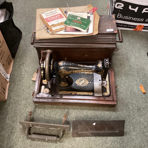 236 - A vintage Singer sewing machine, and two brass letter door boxes