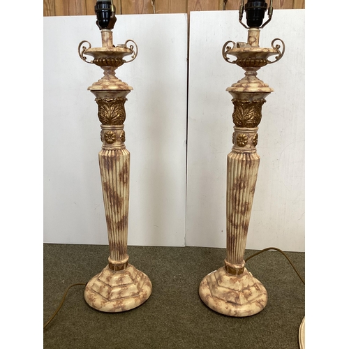 263 - A Pair of modern reeded column table lamps, with cream shades, approx 93cm