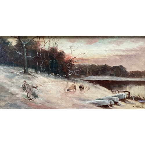 462 - A pair of oil on canvas, Sheep in snowy landscape, signed lower left F. Walters, note verso cleaned ... 