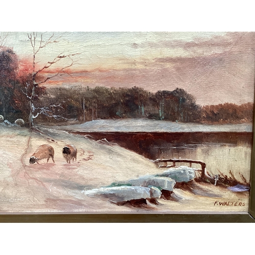 462 - A pair of oil on canvas, Sheep in snowy landscape, signed lower left F. Walters, note verso cleaned ... 