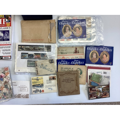 274 - A large collection of loose UK and world stamps.