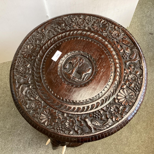 298 - Anglo Indian hardwood occasional table, with carved elephant base, 72cm High