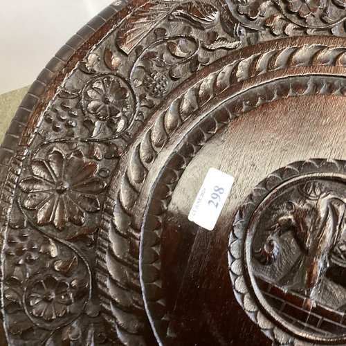 298 - Anglo Indian hardwood occasional table, with carved elephant base, 72cm High