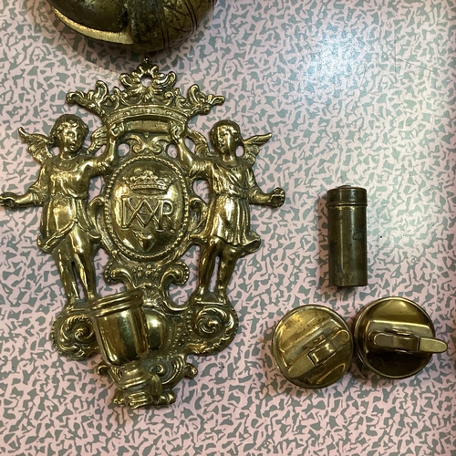 307 - A quantity of metal wares including horse shaped door stops, a slave bangle, brass candlesticks, wal... 